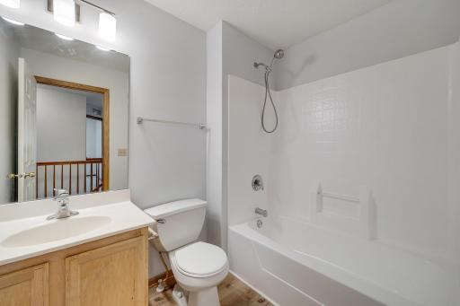 Upper level full bathroom for the two additional bedrooms.
