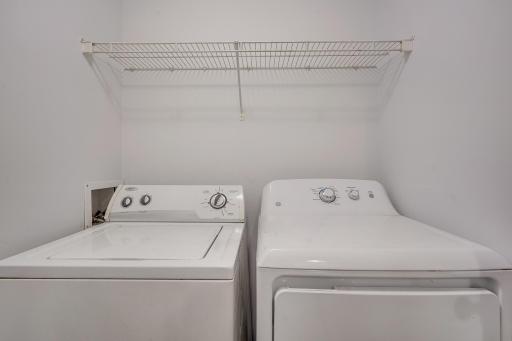 A HUGE BONUS, upper level laundry room area which includes storage.