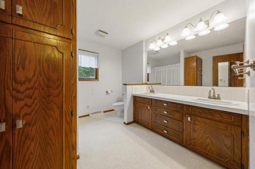 Large full bathroom with double bowl vanity
