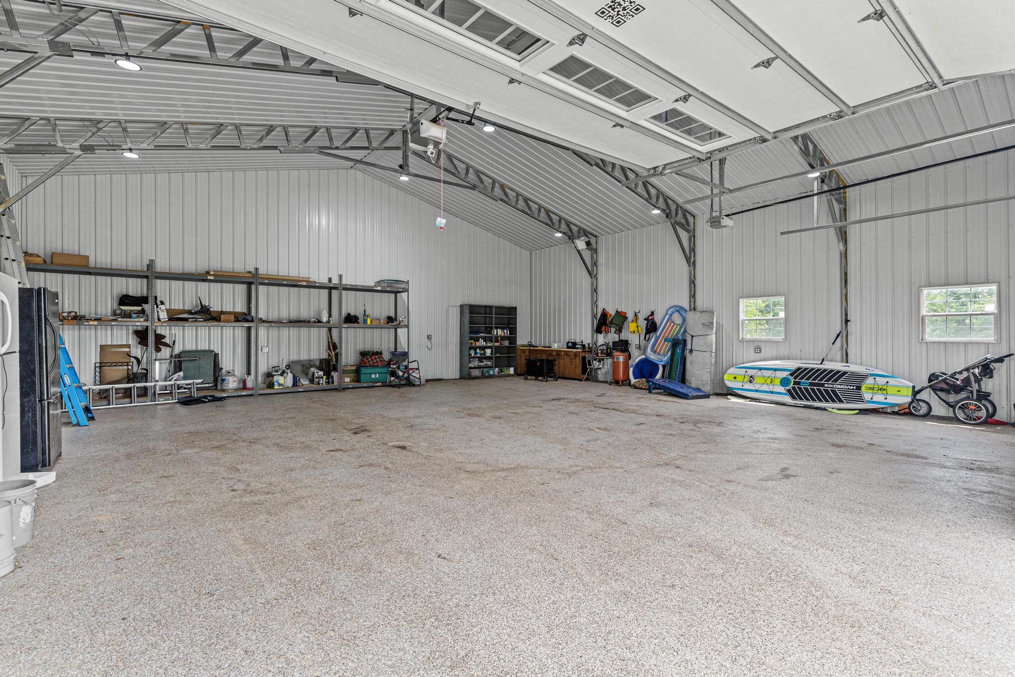 40x40 steel built fully insulated foamed sprayed pole building. Heated ceramic covered cement floors with a heated floor drain.