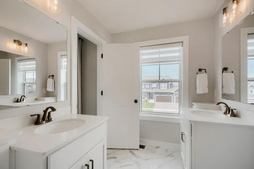 Shared bath with private bedroom access.