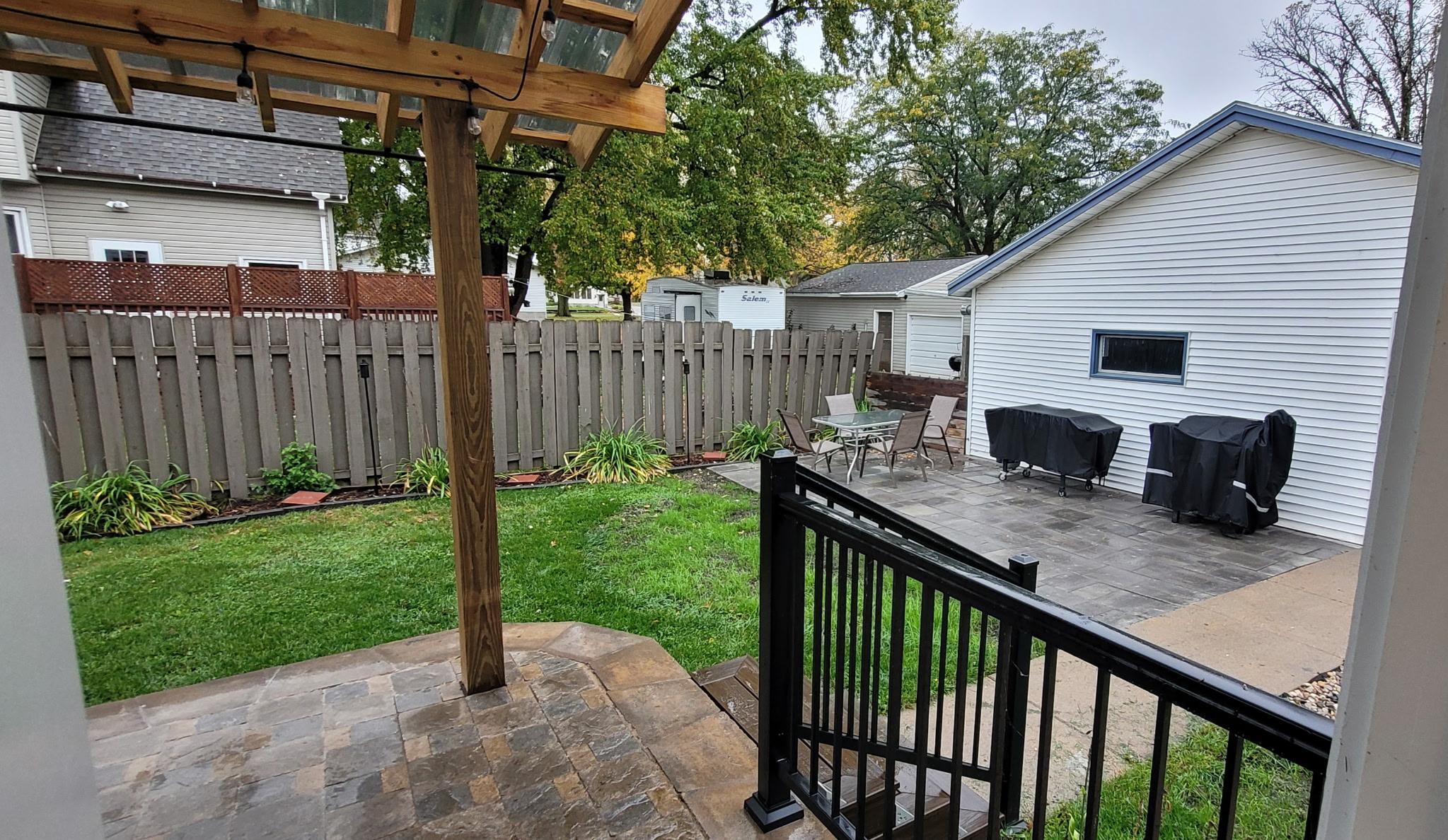 Brand new patio area behind the garage great for hosting.