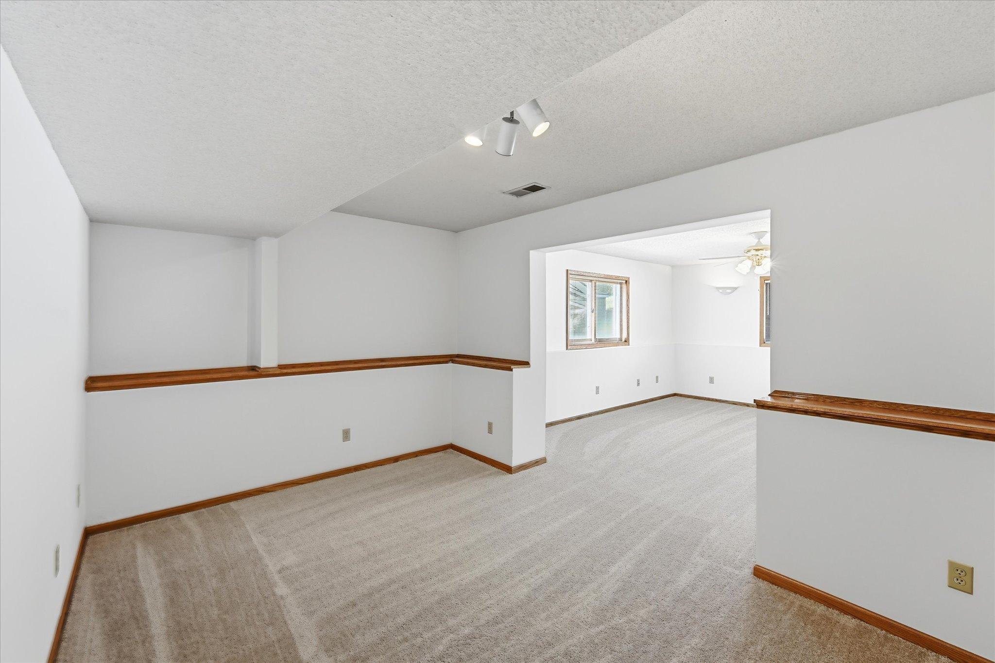 Bedroom 5 in lower level is as expansive as the Primary on the main level