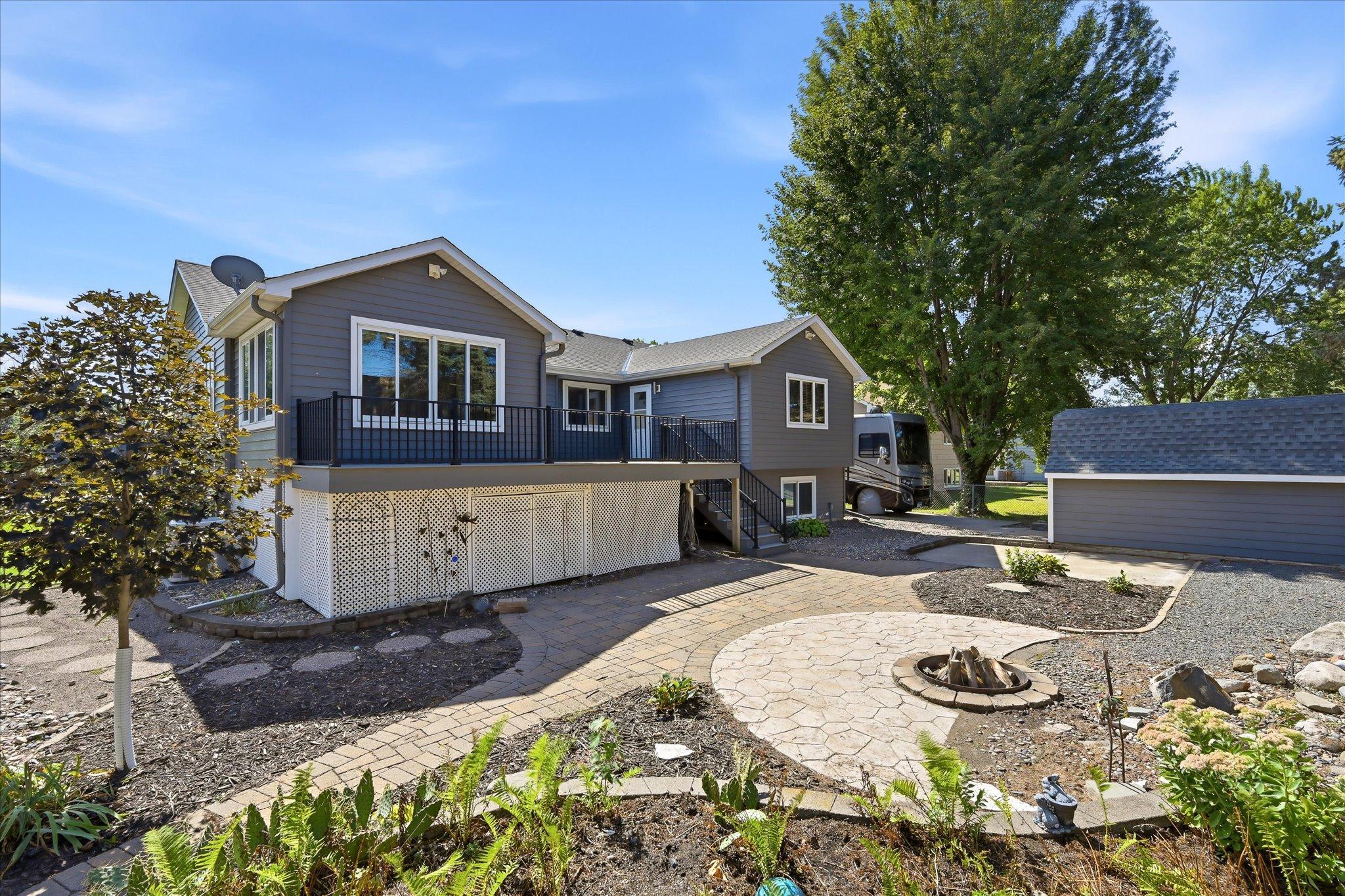 Steel Siding, Soffit, Facia and Gutters make this home shine