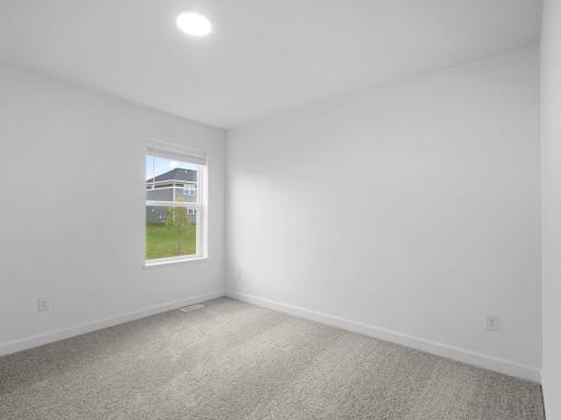The home includes four bedrooms, ready to meet the needs of both large or growing families.