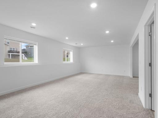 The finished basement offers enhanced versatility with an added recreation area, flex room, bathroom, laundry room and bedroom.