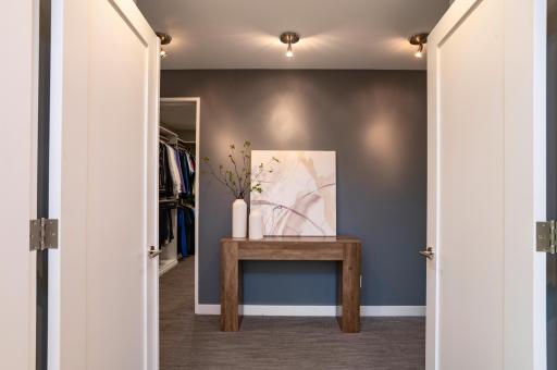 French doors lead you into the expansive primary suite.