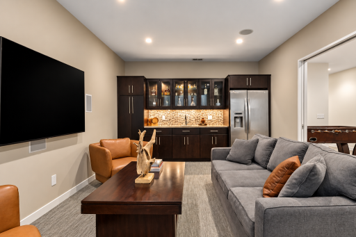 A wet bar and full refrigerator make movie time snacking a breeze.
