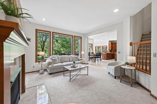 open to kitchen and sunroom