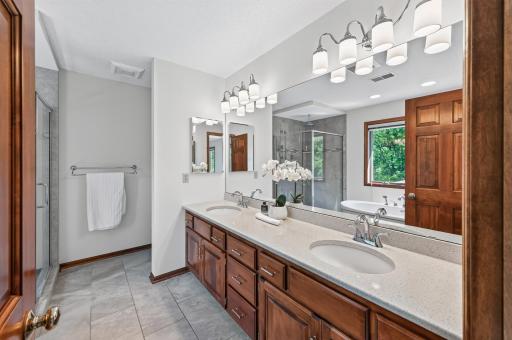 primary en suite with stand alone soaking tub