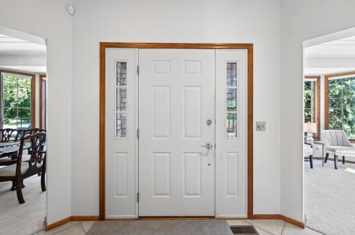 Front foyer entrance with view into dining and sitting areas