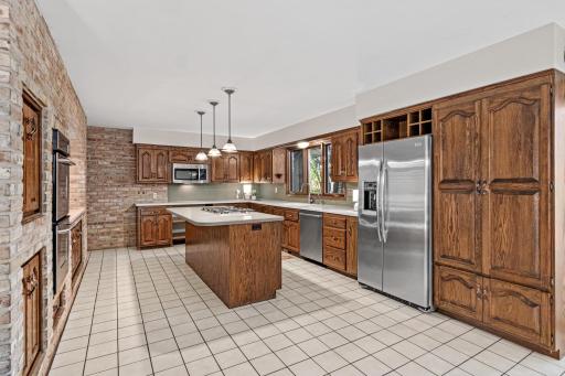 The kitchen is the heart of the home and provides ample space for entertaining, meal prep and gathering with friends.