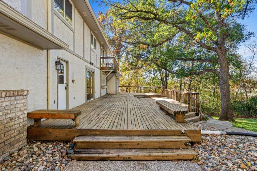 Enjoy morning coffee, summer dinners or evening gatherings surrounded by nature on your oversized deck.