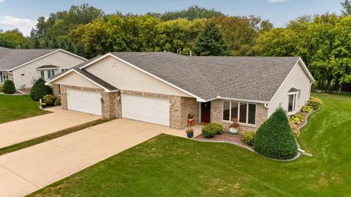 Enjoy low maintenance living in this one level two bedroom, two bath side by side town home nestled on the perfect lot!