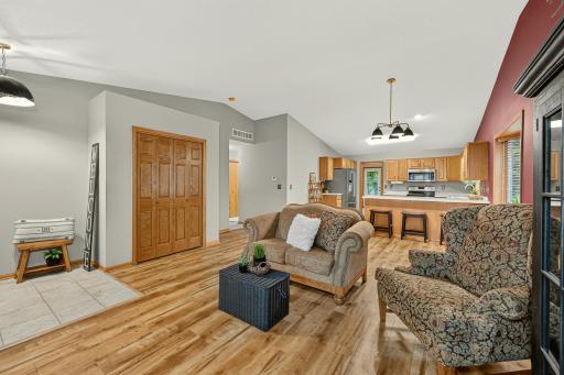 Very spacious and open floor plan. New wood flooring adds warmth throughout living and dining area blending with the kitchen cabinets and paneled closet doors beautifully.