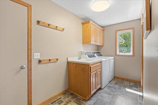 Main Floor Laundry/Storage Room off the Garage