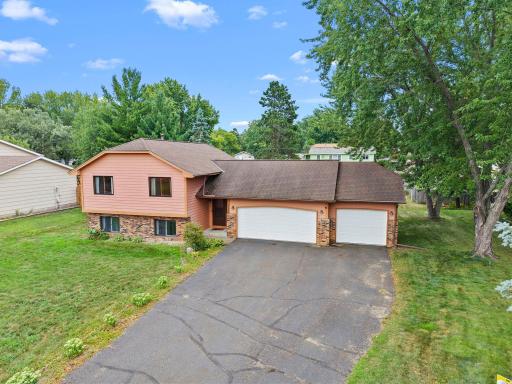 Fabulous Blaine location close to it all. Thoughtful updates and new basement finished in 2025! 3 car garage and large driveway offers extra parking options!