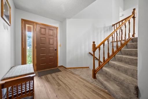 Beautiful LVP flooring spans the entry foyer.