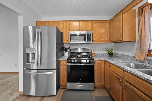 Upgraded Stainless Steel appliances! Beautiful natural wook cabinetry.