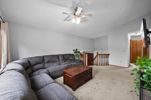 Large living room. Move in ready with neutral carpeting and paint throughout.