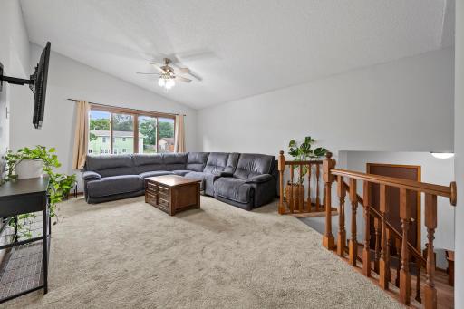 Large living room. Move in ready with neutral carpeting and paint throughout.