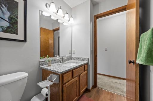 Main level, full bathroom! Walk-through to primary bedroom. Granite countertops and LVP flooring.