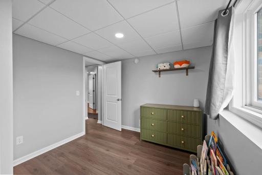 White trimwork and paneled doors.