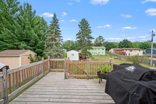Fabulous deck retreat overlooking large backyard.