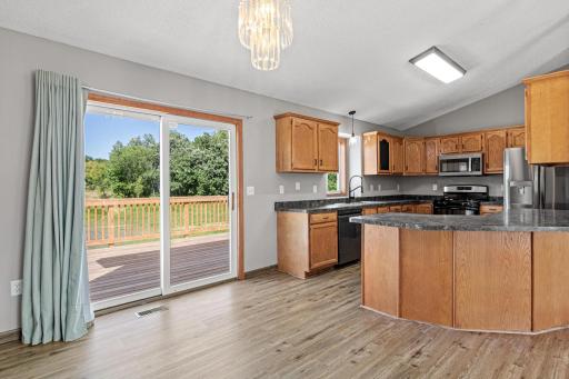 Semi-open concept into the kitchen, easy access to your deck.
