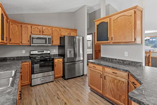 Stainless steel range, microwave and fridge
