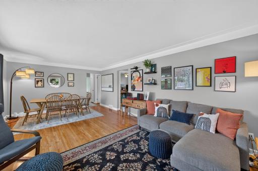 Stunning hardwood floors flow through Living/Dining and all 3 bedrooms