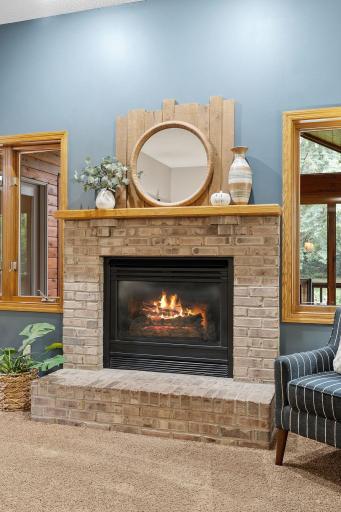 A cozy gas fireplace takes center stage and adding an extra layer of comfort and charm to the room.