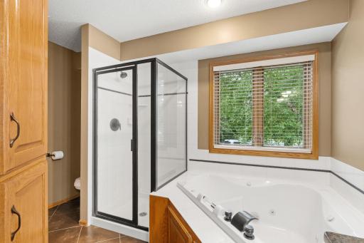 Whether you prefer a soothing soak or an invigorating shower, this ensuite bath provides a delightful and rejuvenating escape.