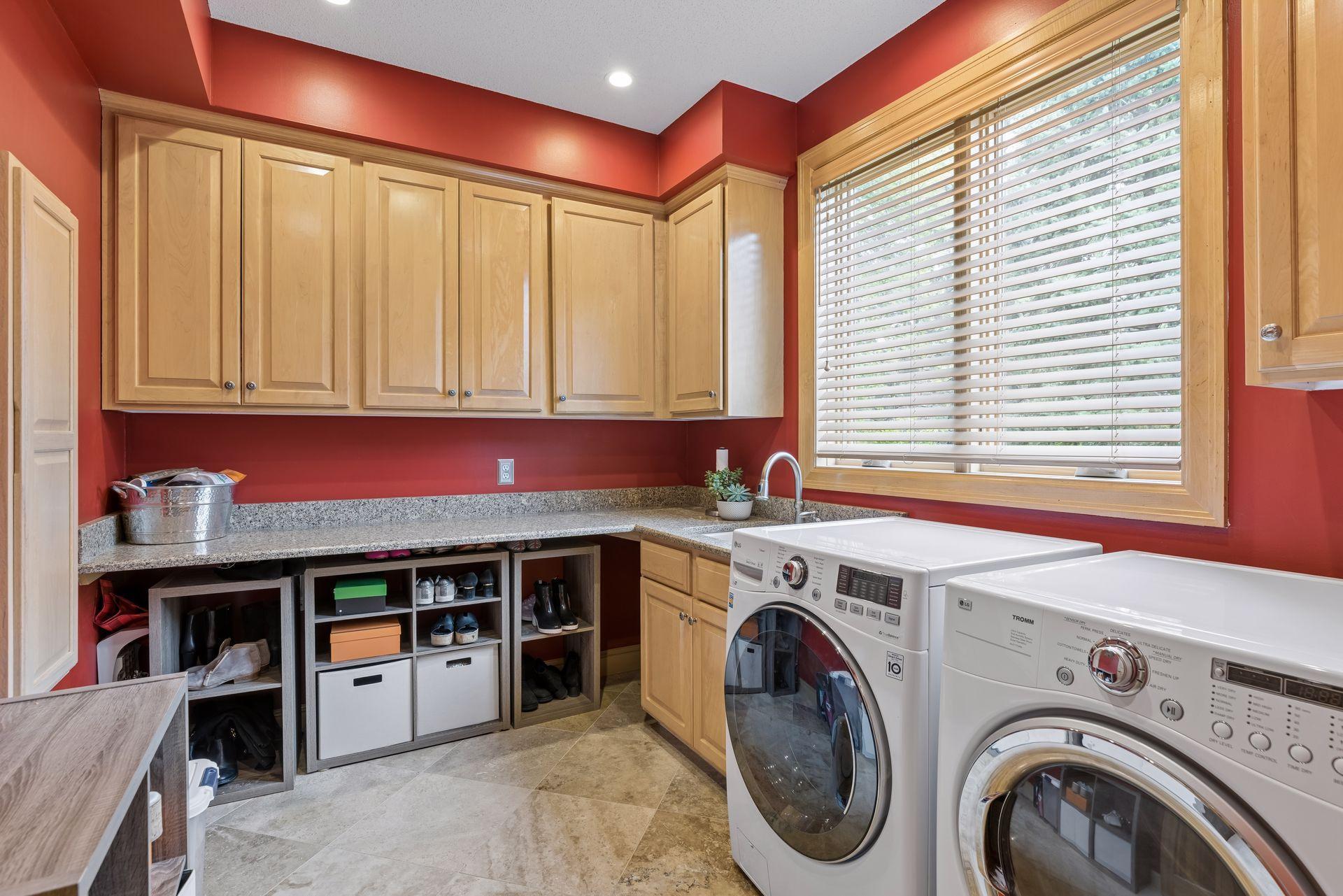 Large Laundry wtih sink and cabinets