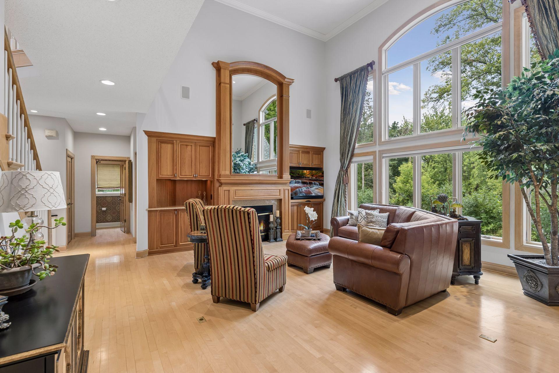 Fireplace Living room with floor to ceiling windows