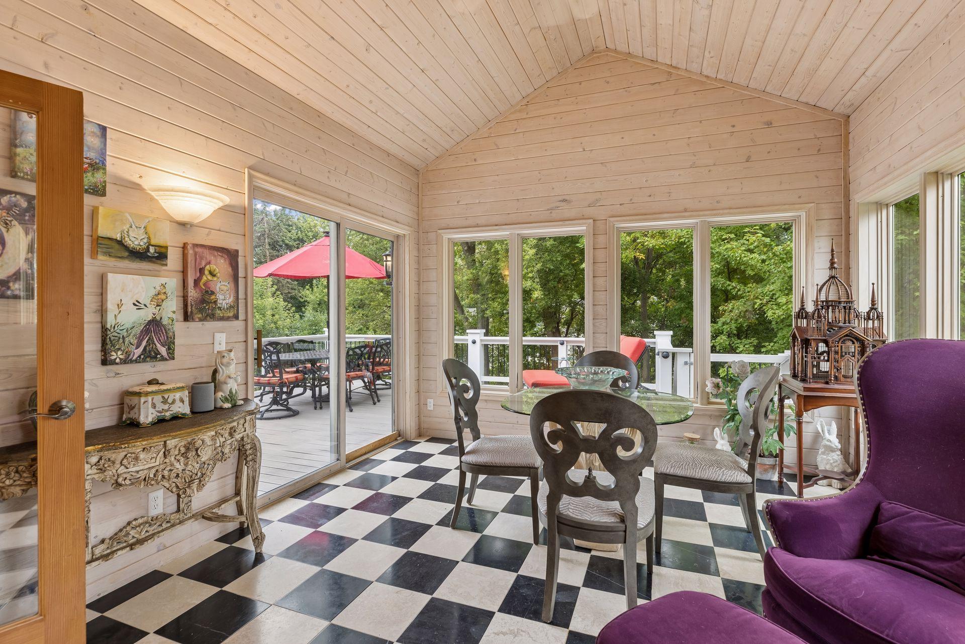 4 Season porch with walls of windows