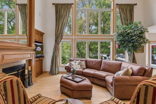 Wall of windows with 2 story Living room