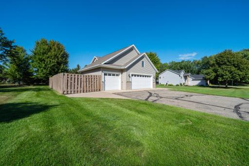 Private fenced in area that is perfect for a boat, car, raised gardens, or play area.