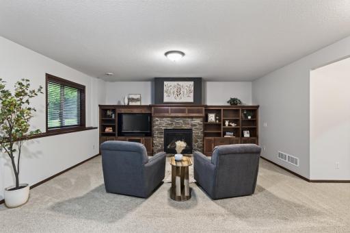 Fully finished lower level with gas fireplace