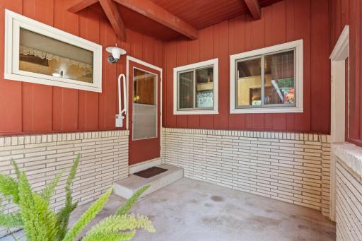 A covered entry welcomes you in while offering a little extra shelter from the elements