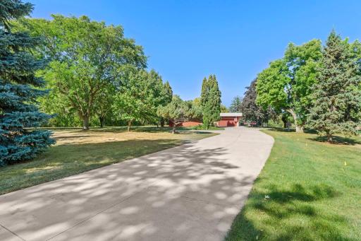 A long driveway leads you in, creating a wonderful sense of arrival and separation from the street