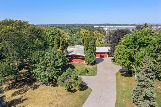 Set back from the road, this spacious home offers a private setting while keeping you close to all that Shakopee has to offer