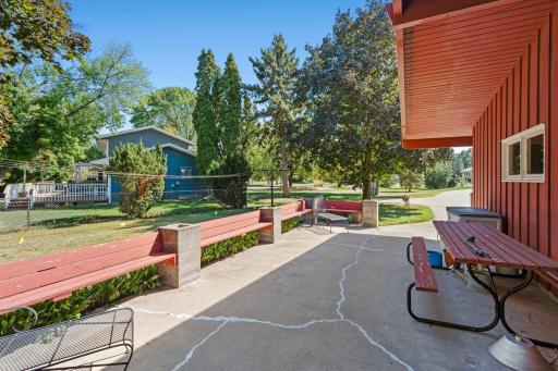 Step outside to a spacious patio with built-in seating, perfect for relaxing, grilling, and enjoying the outdoors