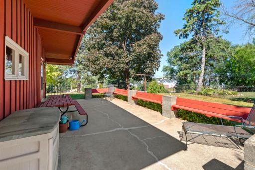 The covered portion of the patio provides a shaded spot for outdoor dining