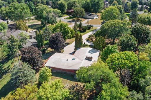 From above, you can really appreciate how nicely the home is tucked among the surrounding mature trees