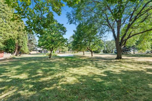 A wide-open lawn offers plenty of room for outdoor activities, games, pets, or simply enjoying the extra space