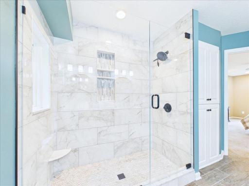 Over sized gorgeous shower in the primary bath