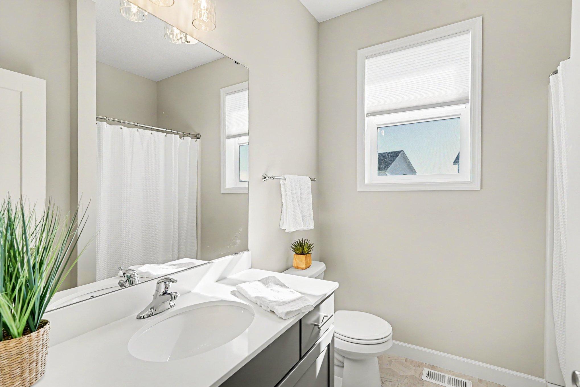 Main floor 3/4 bath with extra shower is a +