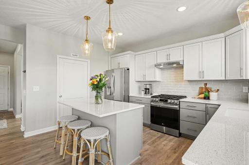 A clean bright kitchen with upgrades stainless appliances