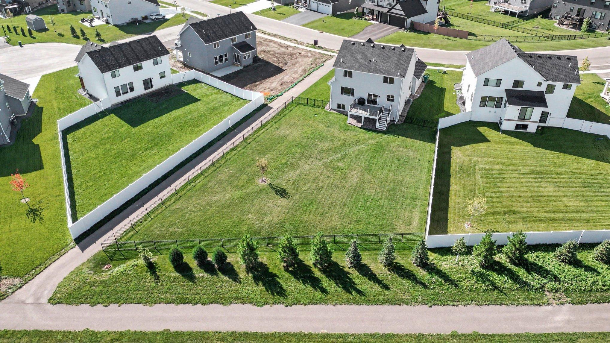 Enjoy your maintenance free custom deck with easy access to the back yard.